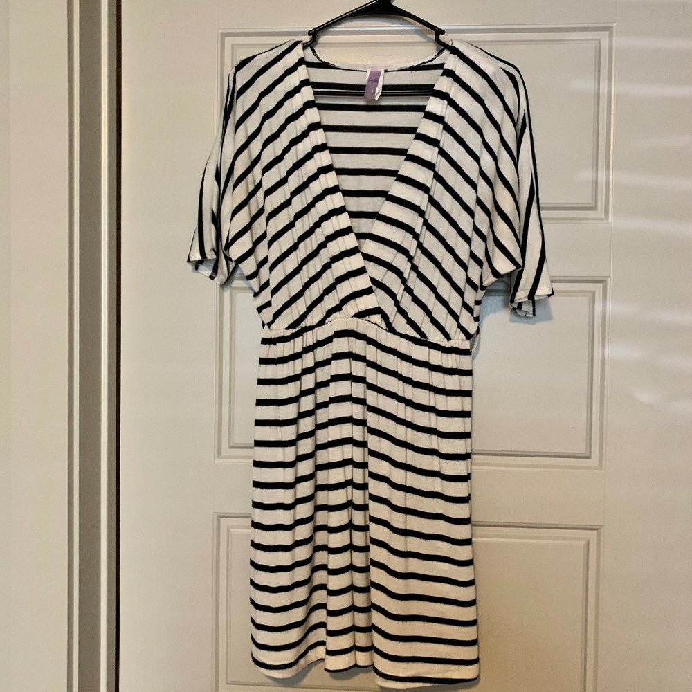 Franchesca's stripped white and navy v-neck dress